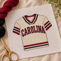 Gamecocks needlepoint canvas styled as a finished Christmas ornament