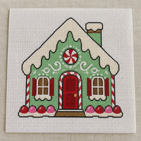 Gingerbread House needlepoint canvas with frosted roof and candy trim holiday scene