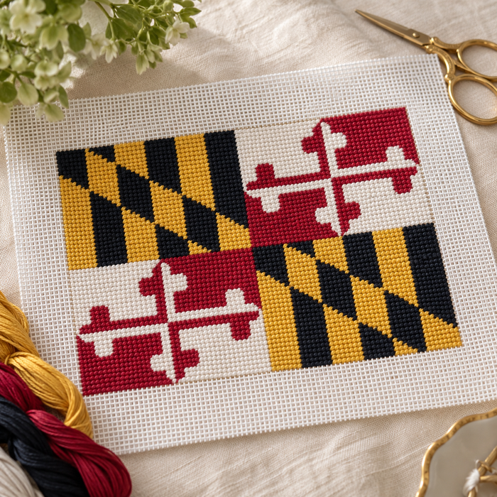 Maryland Flag needlepoint canvas in black, gold, red, and white state flag design